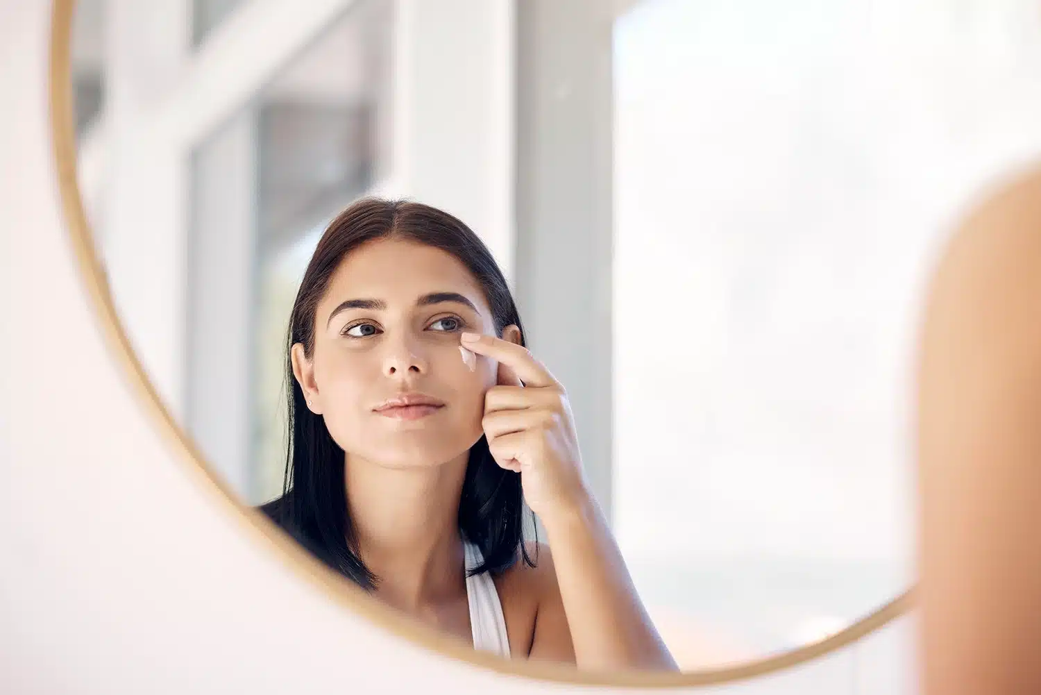 Woman with skincare cream